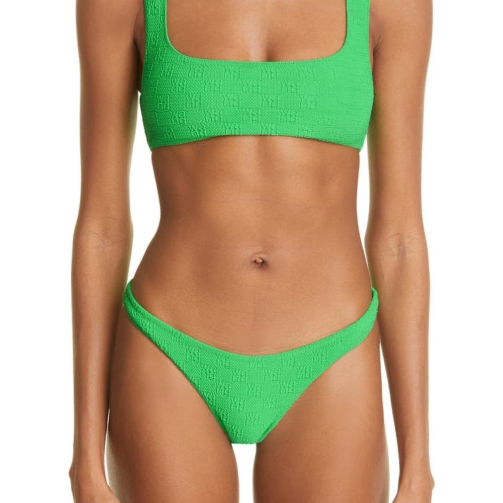 Alexander Wang takes logomania to the beach with tight-fitting bikini bottoms!